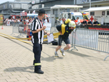 The contest for the title of “The toughest fireman in the world” was held in front of the Morita booth.