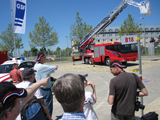 MLL Series ladder truck catches the attention of press.