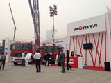 30m Ladder Truck and Lighting Tower Vehicle at Morita Group's booth.
